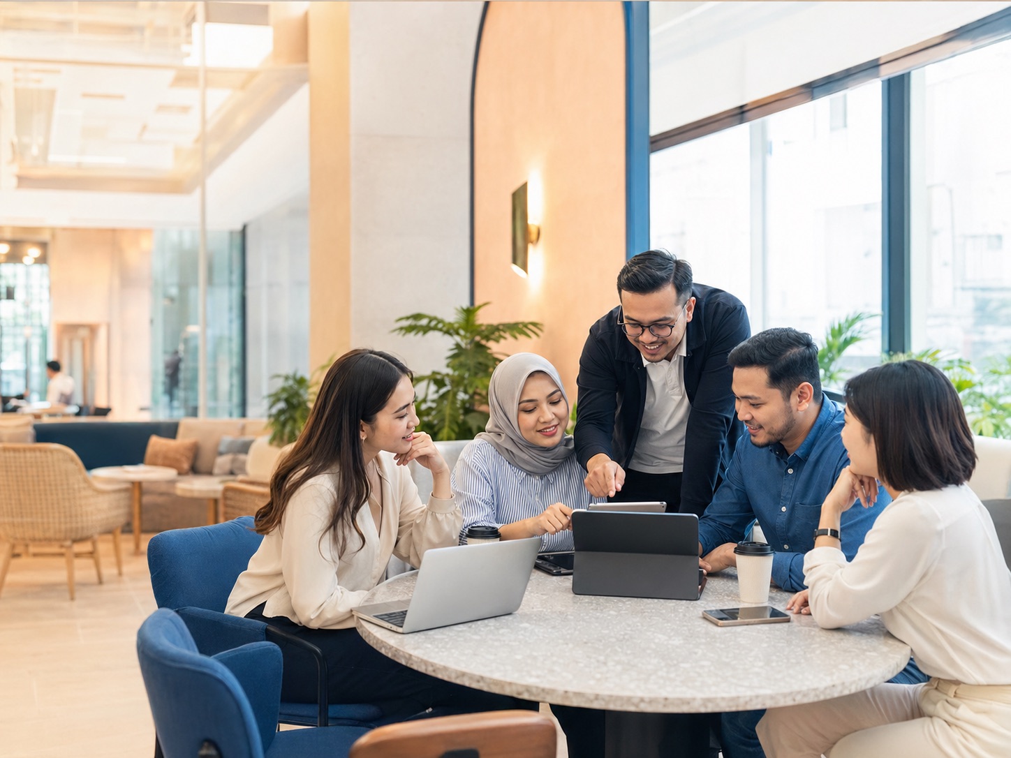 Malaysian hybrid team planning flexible workspace access